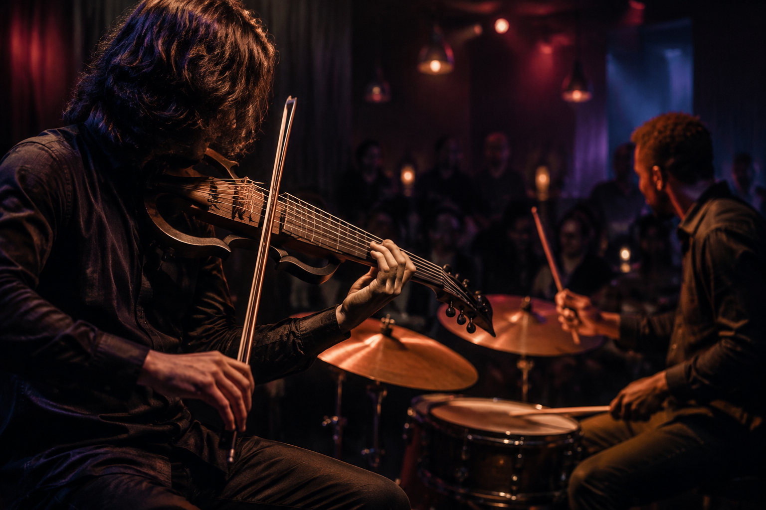 Seven-string electric violinist and drummer improvise together in an intimate contemporary jazz venue.